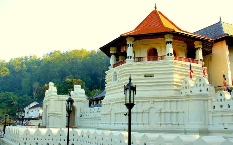 Sacred Temple of the Tooth Relic in Kandy, surrounded by traditional Sri Lankan architecture